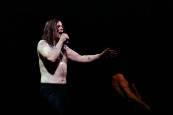 Look ma, no flying mammals! Ozzy Osbourne performing in Milan, Italy in 1995. Source: Shutterstock.