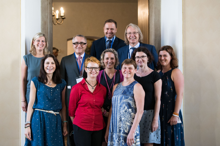 Charles University's Stanislav Kmoch (back row, last on the right) together with colleagues. Kmoch's work and extensive focus on diagnostic methods led to new lab kits for testing for Covid-19.